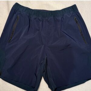 Lululemon Men’s Large Shorts 7” Pace Breaker navy blue lined zip side pockets